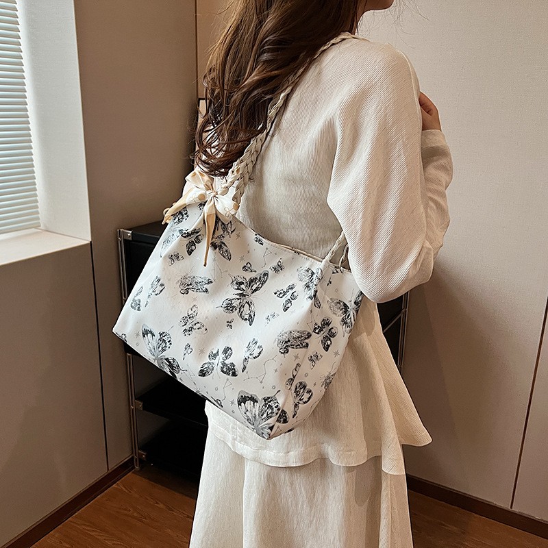 Elegant Pink Butterfly Tote Bag with Braided Handles and Bow Accent